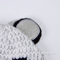 Der wintergestrickte Beruhigungshut der Kinder